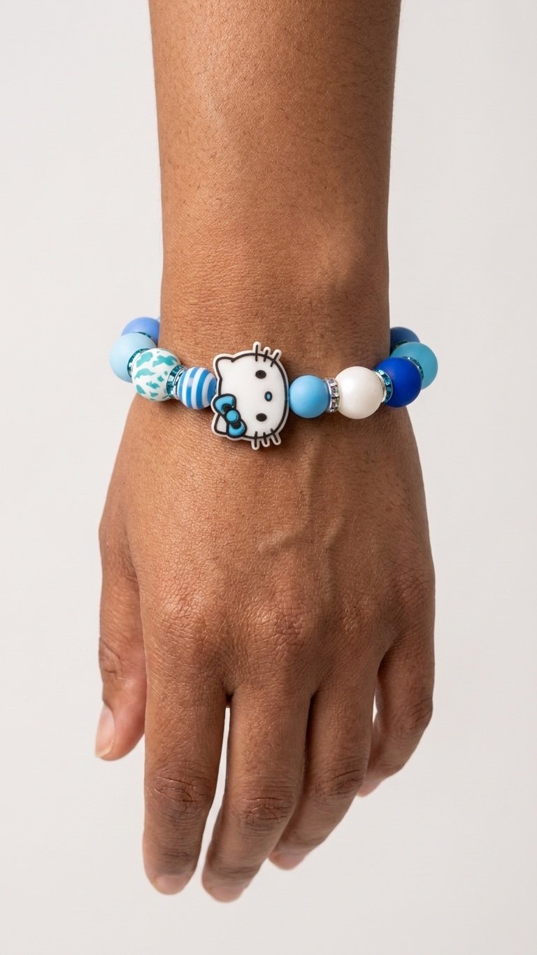 Hello Kitty Blue Charmlet worn on a wrist