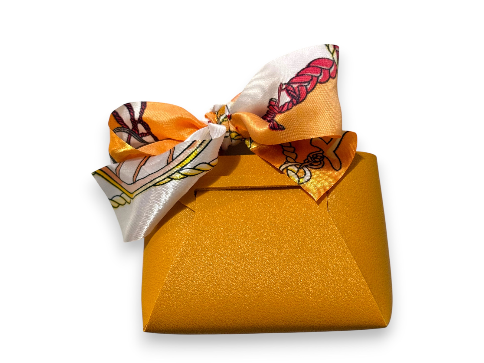 Mustard yellow mini purse with a floral silk scarf bow