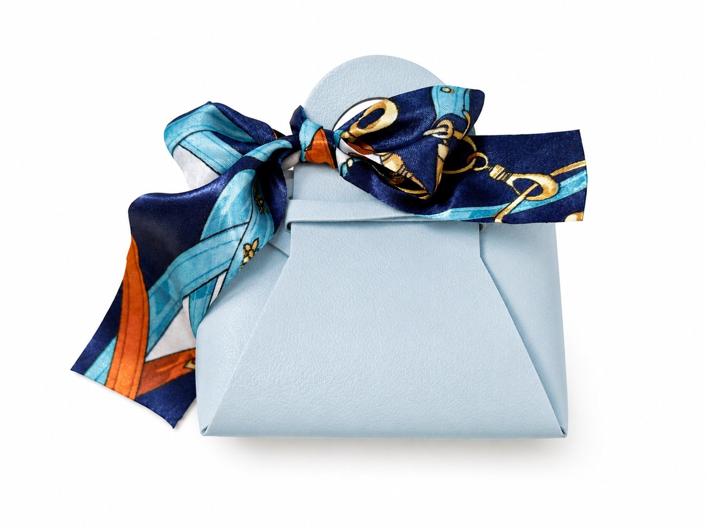 Light blue mini purse with a navy, aqua and orange equestrian silk scarf